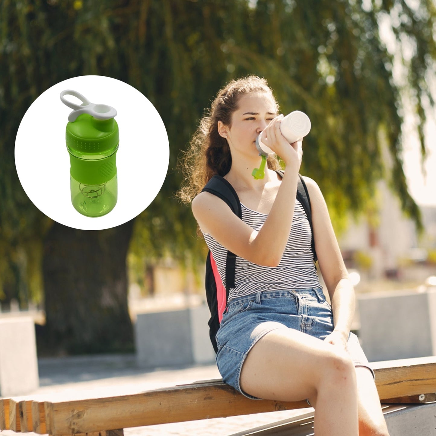 Pre-workout shaker bottle, stainless ball, BPA free, with grip.